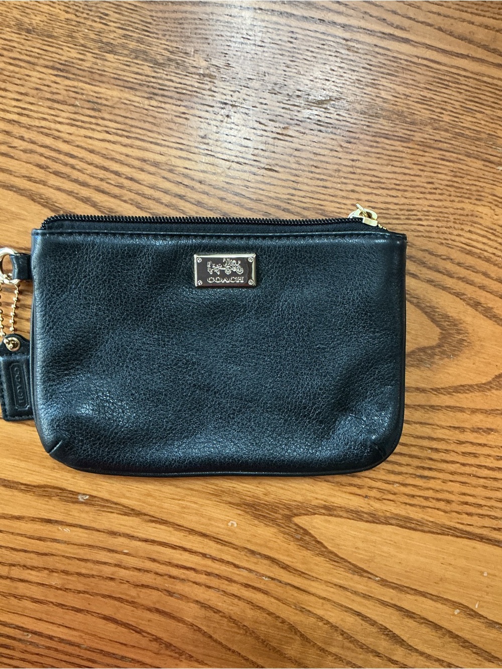 Coach Black Leather with Gold Plaque